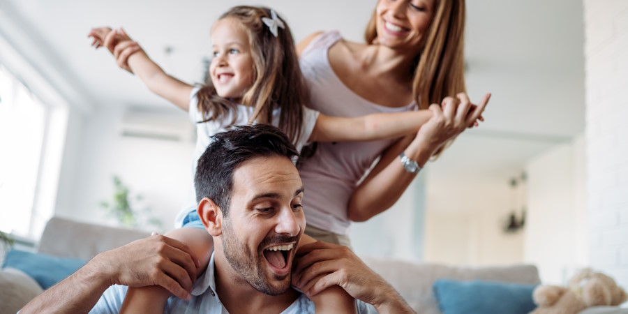Happy family having fun time at home